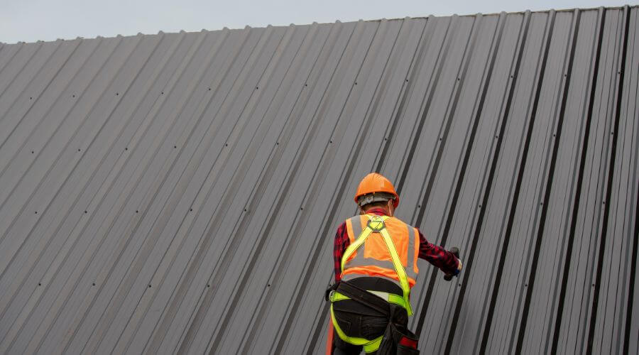 Professional metal roof installation services in Weogufka, AL